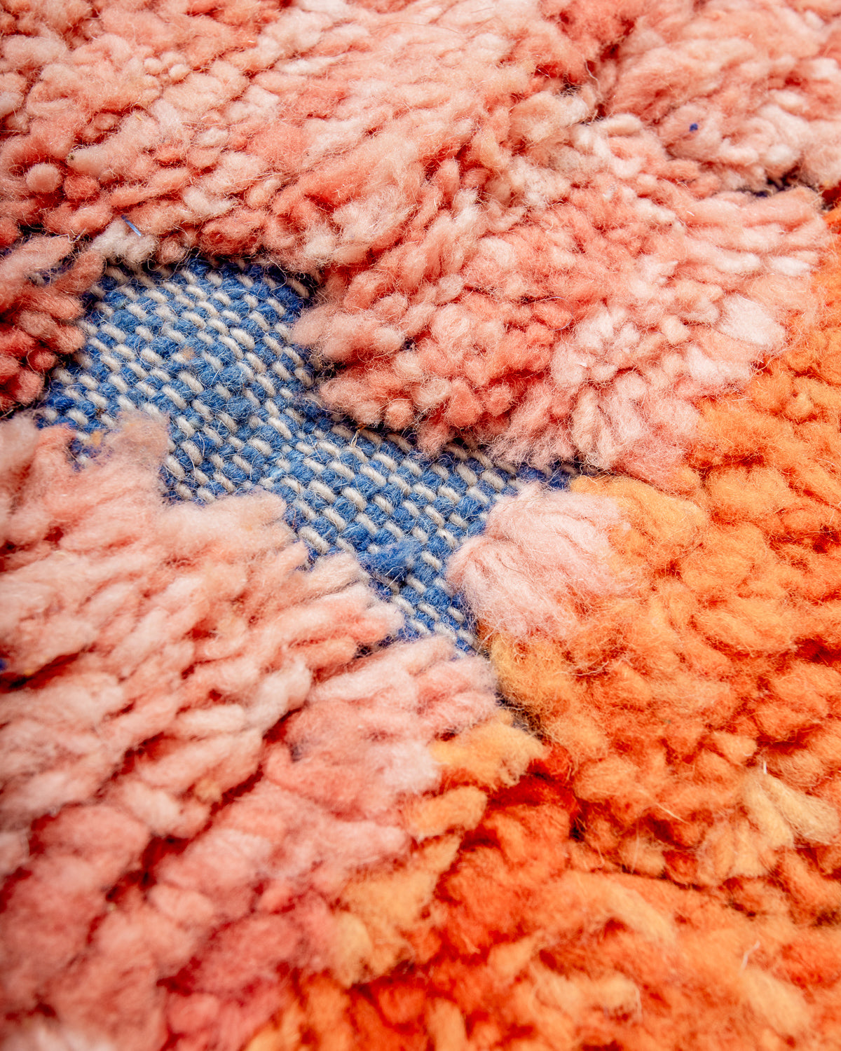 Modern, designer, handcrafted Berber rug from Morocco. Beniourain carpet with beautiful colours and patterns and fluffy wool texture.
